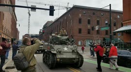 World War II Veteran Clarence Smoyer featured in best-selling novel (Spearhead)  rides through LoDo in vintage army tank