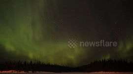 Northern Lights from a frozen river