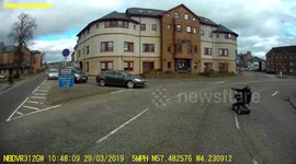 'Kamikaze granny' zooms around busy roundabout on mobility scooter
