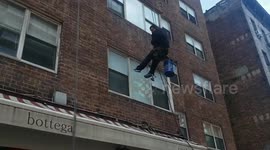Window washer on the building in NY