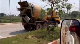 Cement Mixer Drives The Wrong Way Down The Road