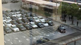 Japanese taxis lineup in an orderly fashion, ready to pick up passengers