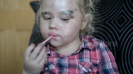 Hilarious moment a three-year-old girl gave her baby brother a TOWIE-style makeover