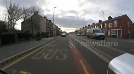Budge up! Tram passes cyclist ridiculously close