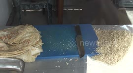 Preparing a food in Sri Lanka's street restaurant