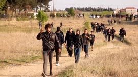 Hundreds of refugees descend on Greece's northern border with Macedonia to re-open migration route