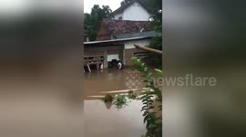 Residents forced to evacuate their home after flash floods hit Indonesia