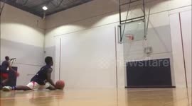 US gymnast pulls off basketball 3-pointer whilst doing the splits