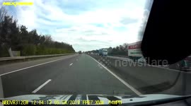 Black Range Rover dangerously undertakes white Audi