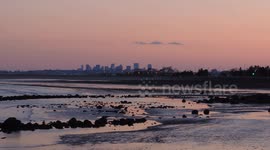 Boston Skyline With Beach At Dusk