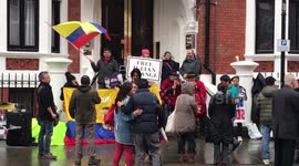 Protestors chant and sing to free Julian Assange