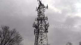 Cell phone tower loaded with antennas and equipment at 5G LTE rollout continues