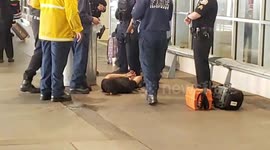 LAX security  Officer saves a man from cutting his throat