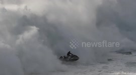 Surfer's massive wipeout followed by incredible jet ski rescue in Portugal