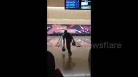 Man makes awesome 'double-ball' bowling strike in Luxembourg