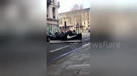 Man spotted driving unique giant Nike shoe around Paris