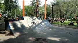 the 8-year-old boy malang city plays his skateboard