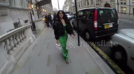 Jackie St Clair And Vick Hope Arrive At The Football for Peace dinner