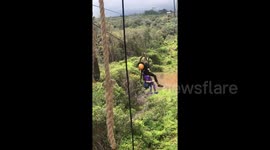 US woman rescued from zip line in Hawaii