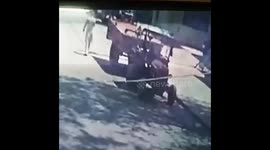 Driver springs back to feet after he falls and is run over by own tractor