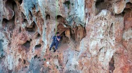 Zooming out shot of rock climbing (drone) 4k