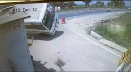 Stunning moment SUV crashes into bus and flips it over on Indian road
