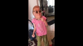 Trump masked girl does the dance