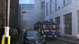 Firefighters tackle blaze at flat in London's Farringdon