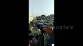 Worrying footage shows kids taking the bus to school -- by sitting on the ROOF