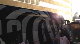 Juventus players leaving the Hotel while surrounded by many Juventus en Ajax fans
