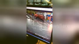 Woman has incredible near miss after out-of-control lorry crashes into roadside