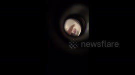 Terrified Liverpool woman films strange man beating on her door late at night