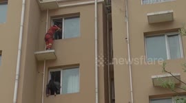 Fireman kicks suicidal girl back to safety in China’s Hebei