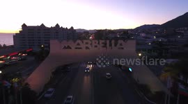 Marbella sign at sunset drone footage
