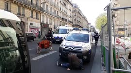 Man performs bizarre dance for police during yellow vest protest in Paris