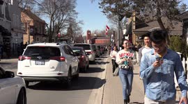 Warm sunny spring day in Markham near Toronto Canada brought out thousands of people onto main street to enjoy the weather after long cold winter
