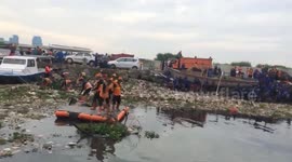 Officers Clean the Marunda Beach in Jakarta, Indonesia