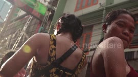 Revellers ignore jail threats for sensual dancing during Thailand's Songkran new year celebrations