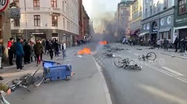 Angry demonstrators light fires on streets of Copenhagen