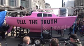 Climate change protesters bring London's Oxford Circus to standstill with pink boat