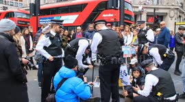 Police arrest climate change activist at Oxford Circus