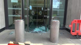 Climate change activists smash windows at Shell's London HQ