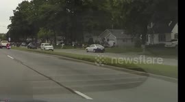 Cops nabbing guy doing burnout while theme song Cops is playing