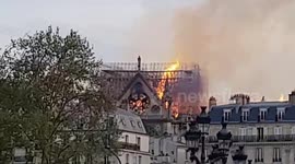 Massive fire tears through Paris cathedral