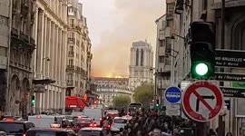 Note Dame Cathedral on fire view from nearby Centre Georges Pompidou