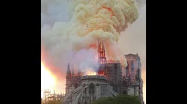 Moment Notre Dame's spire collapses during massive fire