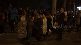 Crowd prays as Notre Dame Cathedral burns