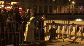 Hymns, prayers as Paris' Notre Dame cathedral burns