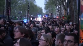 Shocked Parisians watches Notre Dame in flames while security forces covering the area
