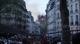 Shocked Parisians watches Notre Dame in flames even from several blocks away